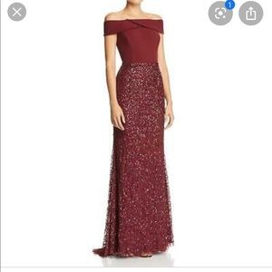 Off the shoulder sequin skirt gown in burgundy